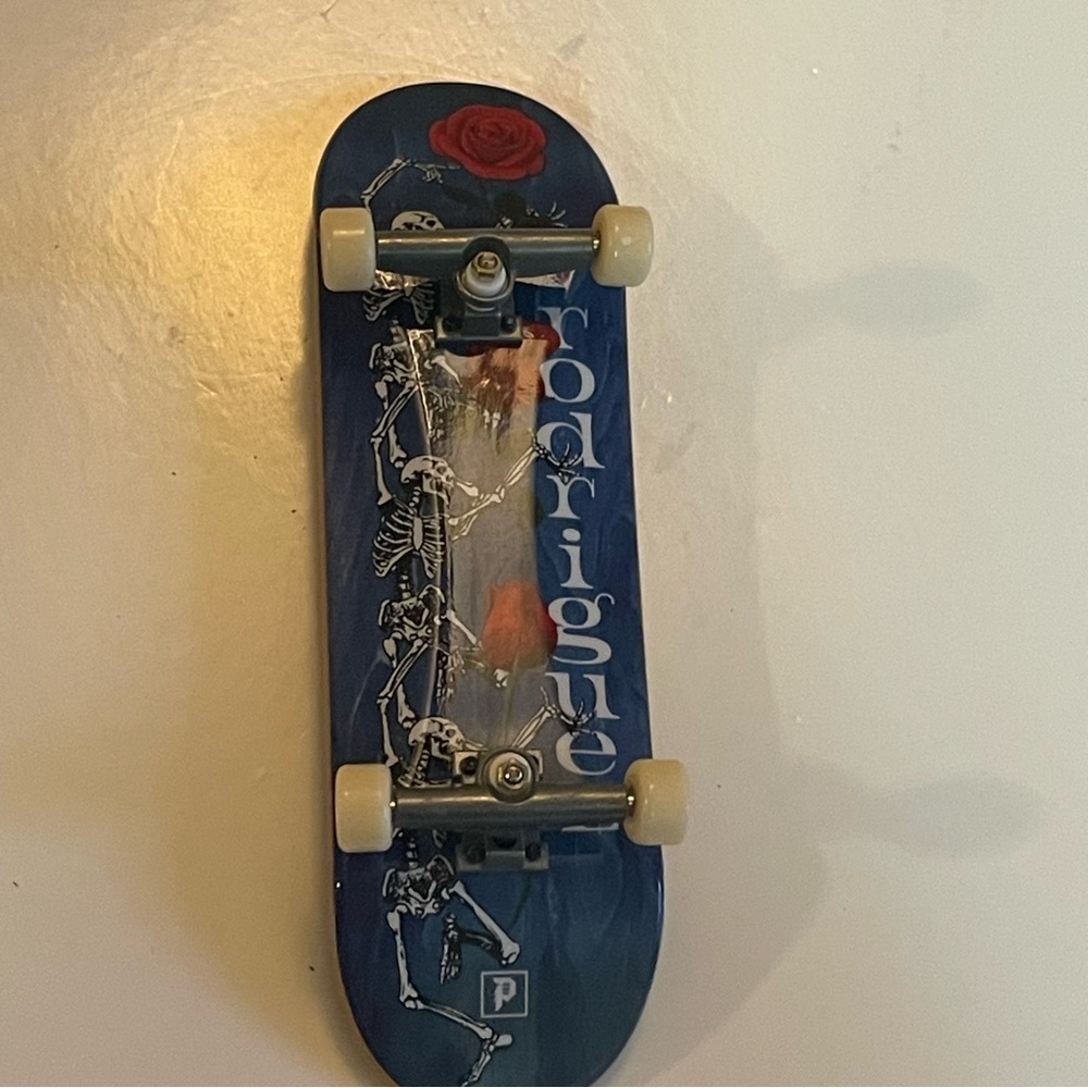 Tech Deck Mini Skateboard with Black Grip Tape skulls and roses